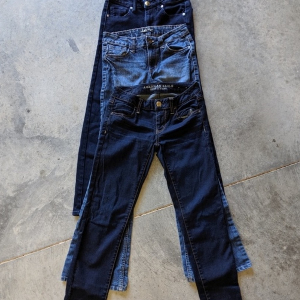 2 pair of American eagle jeans and 1. L.e.i